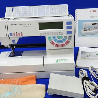 Sale Photo Thumbnail #383: This machine has been well cared for and "sews like a dream".
Vintage, computerized sewing machine, 229 stitches.
Embroidery unit has case and hoops and the embroidery arm.
Very nice condition.