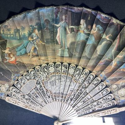 Sale Photo Thumbnail #389: Professionally framed, 25 x 29 3/4 inches
The top fan is Spanish origin, the bottom fan is French.  
Amazing hand painted antique fans, you will be stunned at the details.

The Spanish fan is likely from the 18th or 19th century, featuring carved and pier