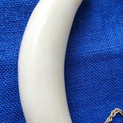 Sale Photo Thumbnail #418: 16" overal length, the tooth is 3.5 inches long
The chain tests at 10K gold