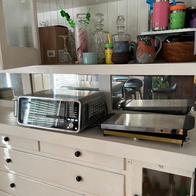 Sale Photo Thumbnail #108: Ninja Digital Air Fry Countertop Oven, 8-in-1 Functionality, 1800W, Flip-Up Design, XL Capacity, Air Fry Basket, Wire Rack & Crumb Tray, Silver, SP101