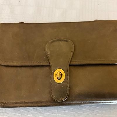 Sale Photo Thumbnail #127: The brown purse has identical openings, both back and front.