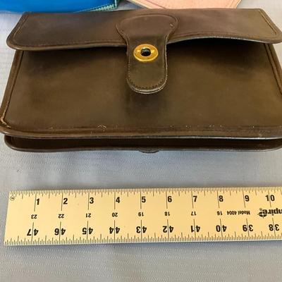 Sale Photo Thumbnail #126: The brown purse has identical openings, both back and front.