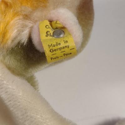 Sale Photo Thumbnail #904: Vintage Steiff Mungo Monkey Hand Puppet Doll- Approx 8 1/2" Tall.  Item is complete with original ear tag.