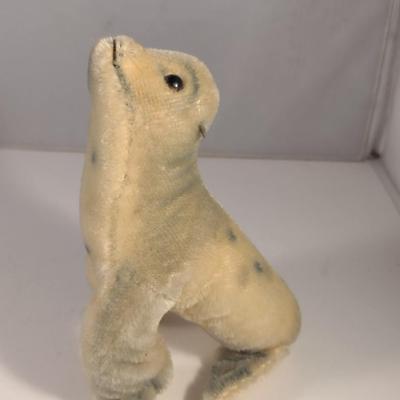 Sale Photo Thumbnail #909: Vintage Steiff Baby Seal Doll- Approx 7 1/2" Tall