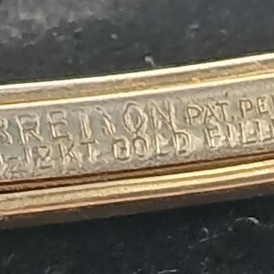 vintage Bulova ladies' watch, likely from the 1940s to 1960s, with a 10k gold-filled case and a manual wind-up movement. 12 k gf
