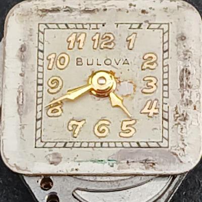 vintage Bulova ladies' watch, likely from the 1940s to 1960s, with a 10k gold-filled case and a manual wind-up movement. 12 k gf