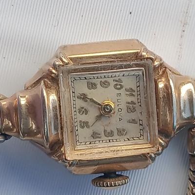 vintage Bulova ladies' watch, likely from the 1940s to 1960s, with a 10k gold-filled case and a manual wind-up movement. 12 k gf