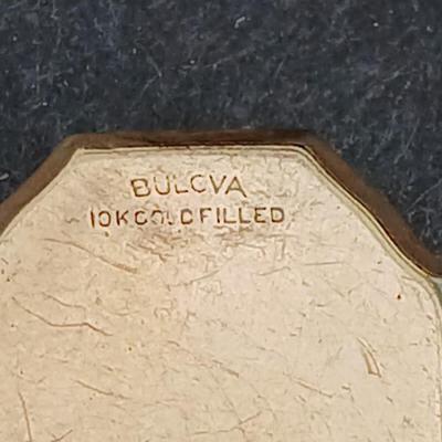 vintage Bulova ladies' watch, likely from the 1940s to 1960s, with a 10k gold-filled case and a manual wind-up movement. 12 k gf