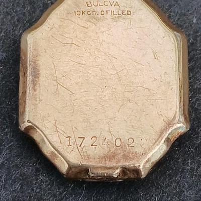 vintage Bulova ladies' watch, likely from the 1940s to 1960s, with a 10k gold-filled case and a manual wind-up movement. 12 k gf
