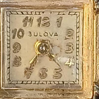 vintage Bulova ladies' watch, likely from the 1940s to 1960s, with a 10k gold-filled case and a manual wind-up movement. 12 k gf