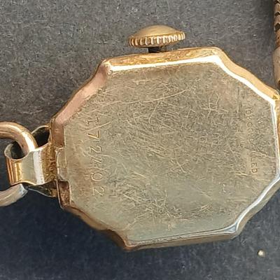 vintage Bulova ladies' watch, likely from the 1940s to 1960s, with a 10k gold-filled case and a manual wind-up movement. 12 k gf