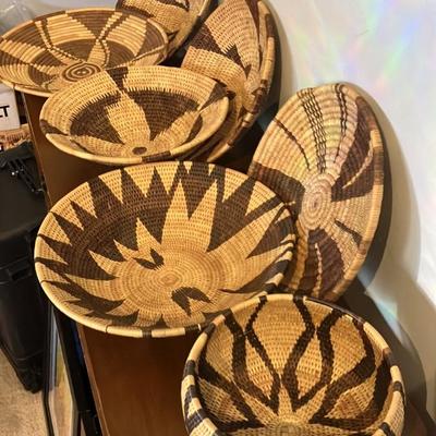 Collection of 7 handwoven Botswana baskets.