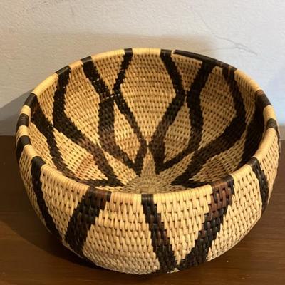 Collection of 7 handwoven Botswana baskets.