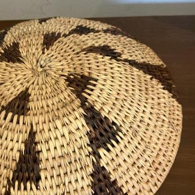 Collection of 7 handwoven Botswana baskets.