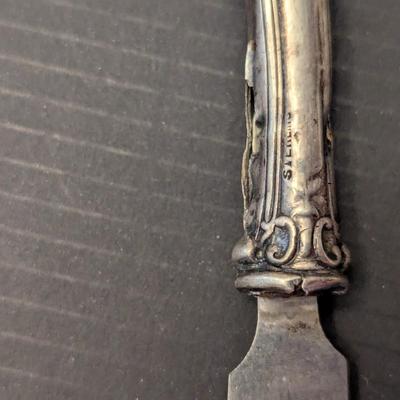 Sale Photo Thumbnail #3297: The knife has a Sterling handle.  I did not weight the knife