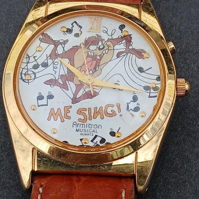 Sterling silver Mickey Mouse earrings and an Armitron Tasmanian Devil musical watch