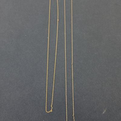 Two broken 14k gold necklace chains - 14 k - 2.04 grams for repair or scrap
