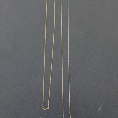 Two broken 14k gold necklace chains - 14 k - 2.04 grams for repair or scrap