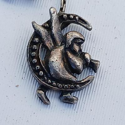 Kirk Folly like Angel charm necklace silver toned - with an Anne Klein II water resistant watch