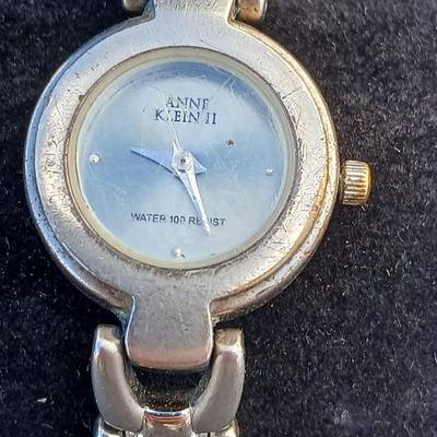 Kirk Folly like Angel charm necklace silver toned - with an Anne Klein II water resistant watch