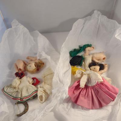 Sale Photo Thumbnail #931: Two Madam Alexander Dolls in Need of Repair.  From the 'Friends from Foreign Lands' collection- Portugal and Hungary