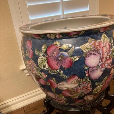 Sale Photo Thumbnail #126: Medium sized fruit and floral pattern Chinese floor vase with wooden base, measuring 10" H x 12.5" diameter