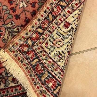 Sale Photo Thumbnail #143: Pink/red Persian rug with normal wear, no significant damage, mild ink bleed. In good condition. Measures 37" L x 26" W