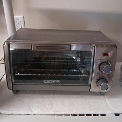 GENTLY USED TOASTER OVEN AND METAL BOWLS WITH LIDS