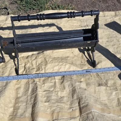 Pair of vintage Cast Iron Andirons - With antique Cast Iron paper / newspaper log roller wood handle crank Fireplace tools