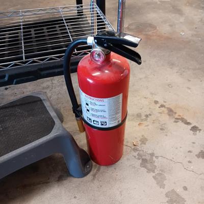 NO SLIDE MATERIAL, SMALL METAL STORAGE SHELF, FIRE EXTINGUISHER & STOOL
