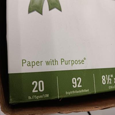 9 REAMS OF WHITE COPY PAPER AND AN ELECTRIC PENCIL SHARPENER