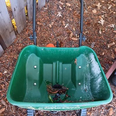 WHEELBARROW AND A SPREADER