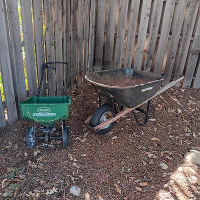 WHEELBARROW AND A SPREADER