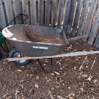 WHEELBARROW AND A SPREADER