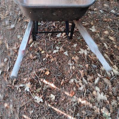 WHEELBARROW AND A SPREADER