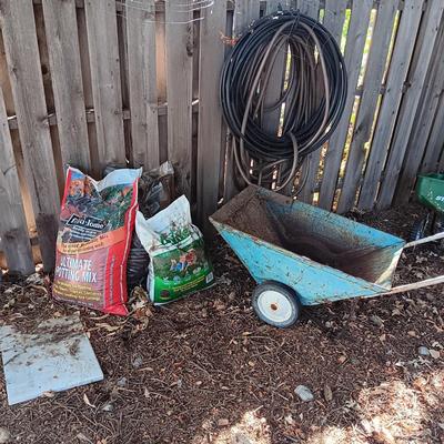 GARDEN CART, BAG OF FERTILIZER, TOPSOIL AND BARK (HOSE NOT INCLUDED)