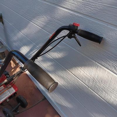 HONDA ROTOTILLER AND FULL GAS CAN