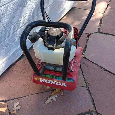 HONDA ROTOTILLER AND FULL GAS CAN