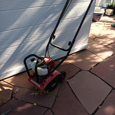 HONDA ROTOTILLER AND FULL GAS CAN