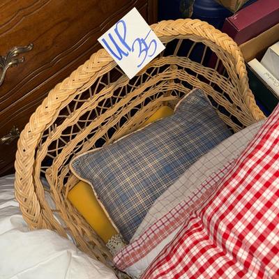 Sale Photo Thumbnail #533: UP35-wicker bassinet With pillows and blankets