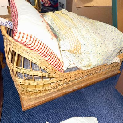 Sale Photo Thumbnail #534: UP35-wicker bassinet With pillows and blankets