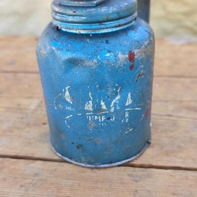 Two blue metal oil cans - Rainbow Pump Eagle Mfg. -