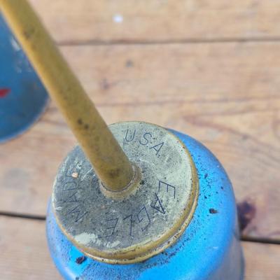 Two blue metal oil cans - Rainbow Pump Eagle Mfg. -