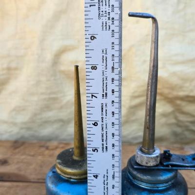Two blue metal oil cans - Rainbow Pump Eagle Mfg. -