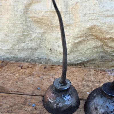 Four vintage oil cans - 2 small thumb press dome cans and 2 larger