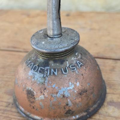 Four vintage oil cans - 2 small thumb press dome cans and 2 larger