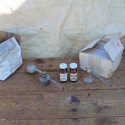Two vintage Atomizer with two boxes of brown colored medicine bottles