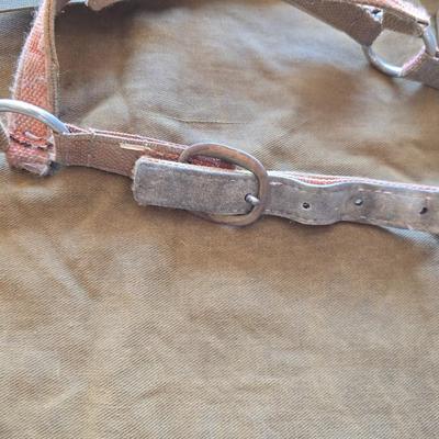 Vintage horse blanket with four old halters