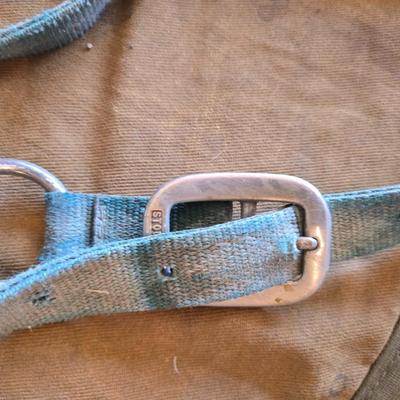 Vintage horse blanket with four old halters