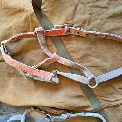 Vintage horse blanket with four old halters